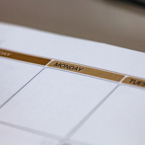A close-up of a calendar page showing the word "Monday" in bold letters at the top of a column, with empty white spaces below for notes or events.